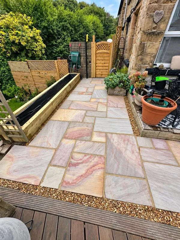 Garden renovation with Indian sandstone patio in Buxton